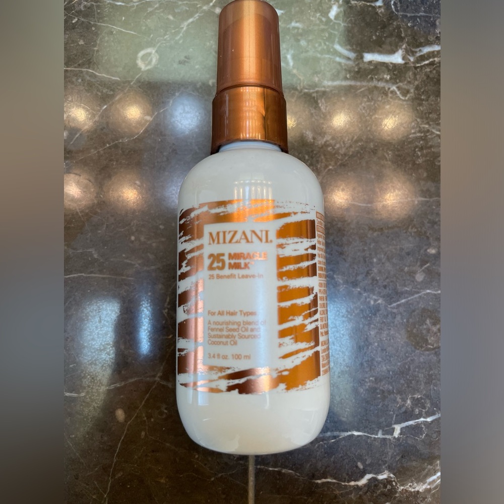 Mizani 25 miracle milk Leave in conditioner, heat protection & detangler.